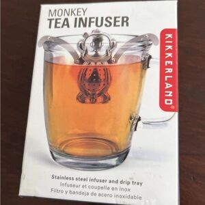 New in Box Monkey Tea Infuser by Kikkerland. Includes drip tray.